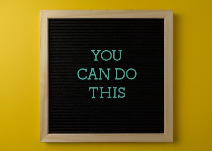 Inspirational message 'You Can Do This' displayed on a blackboard with a bold yellow backdrop.